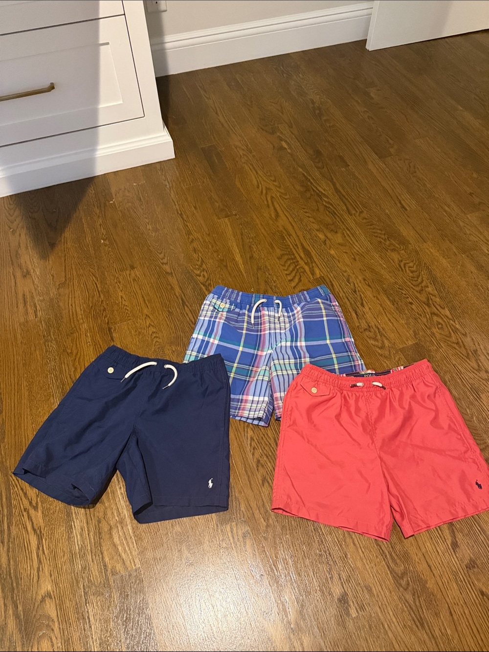 3 pairs of swim trunks